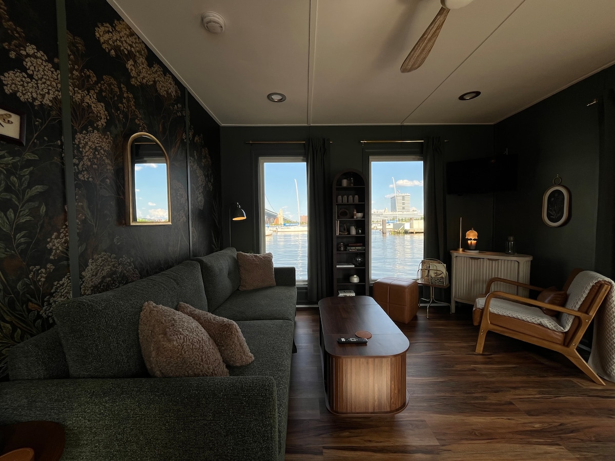Living room sofa and botanical mural