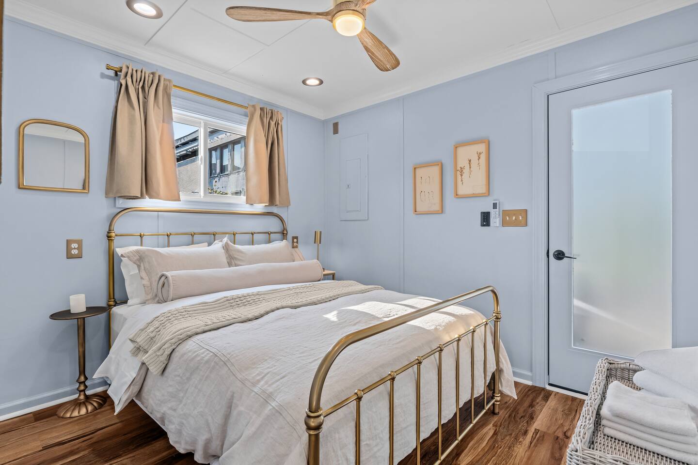 Bedroom with brass bed frame
