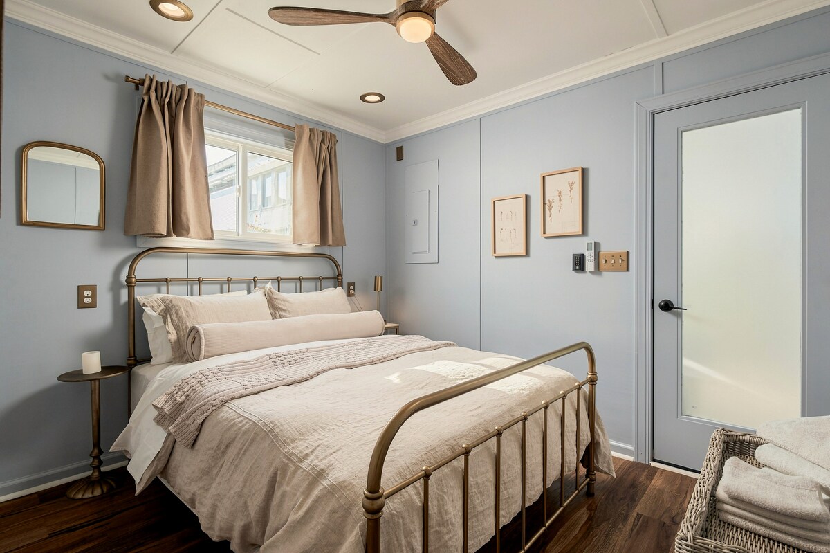 Bedroom with brass bed frame