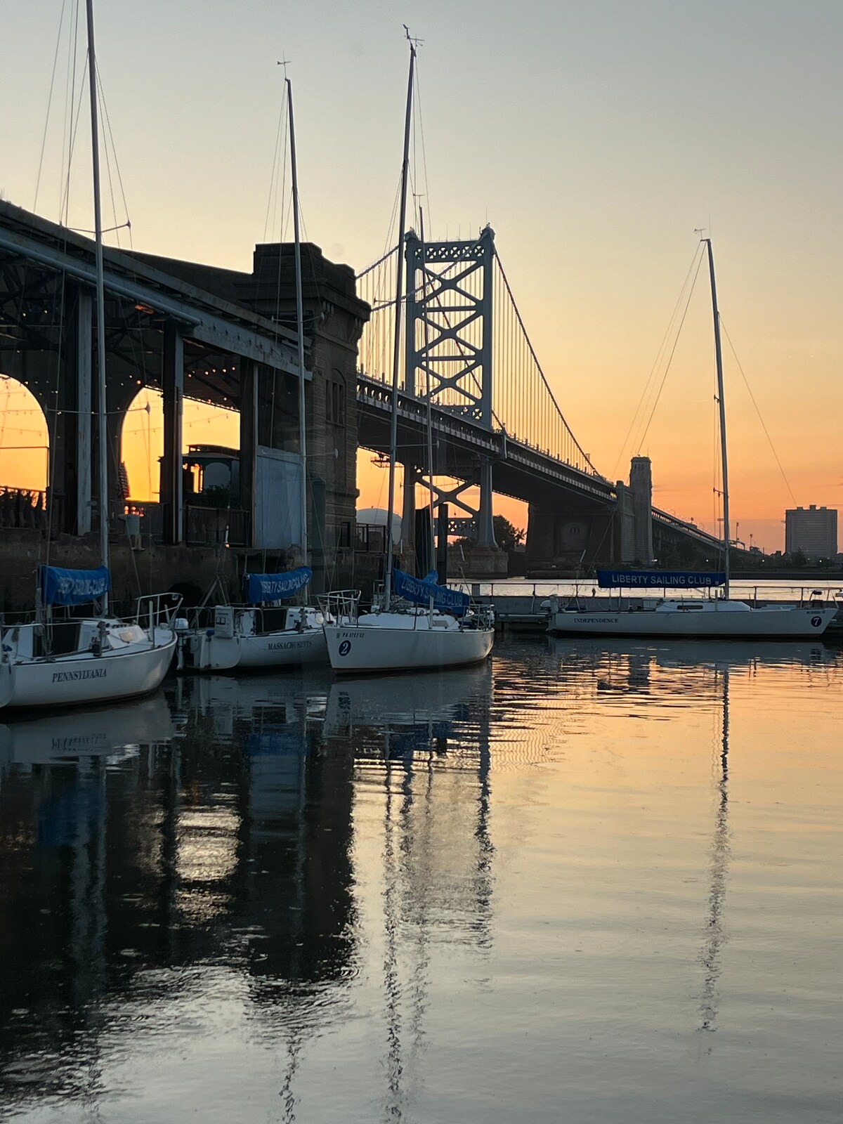 Marina at sunset beneath the bridge