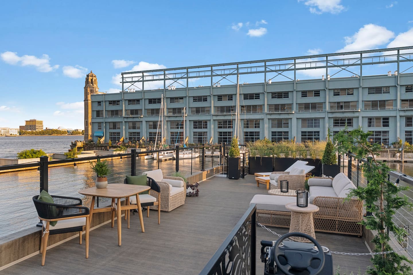 Rooftop seating and dining on The Sylvan looking across Pier 5 Marina