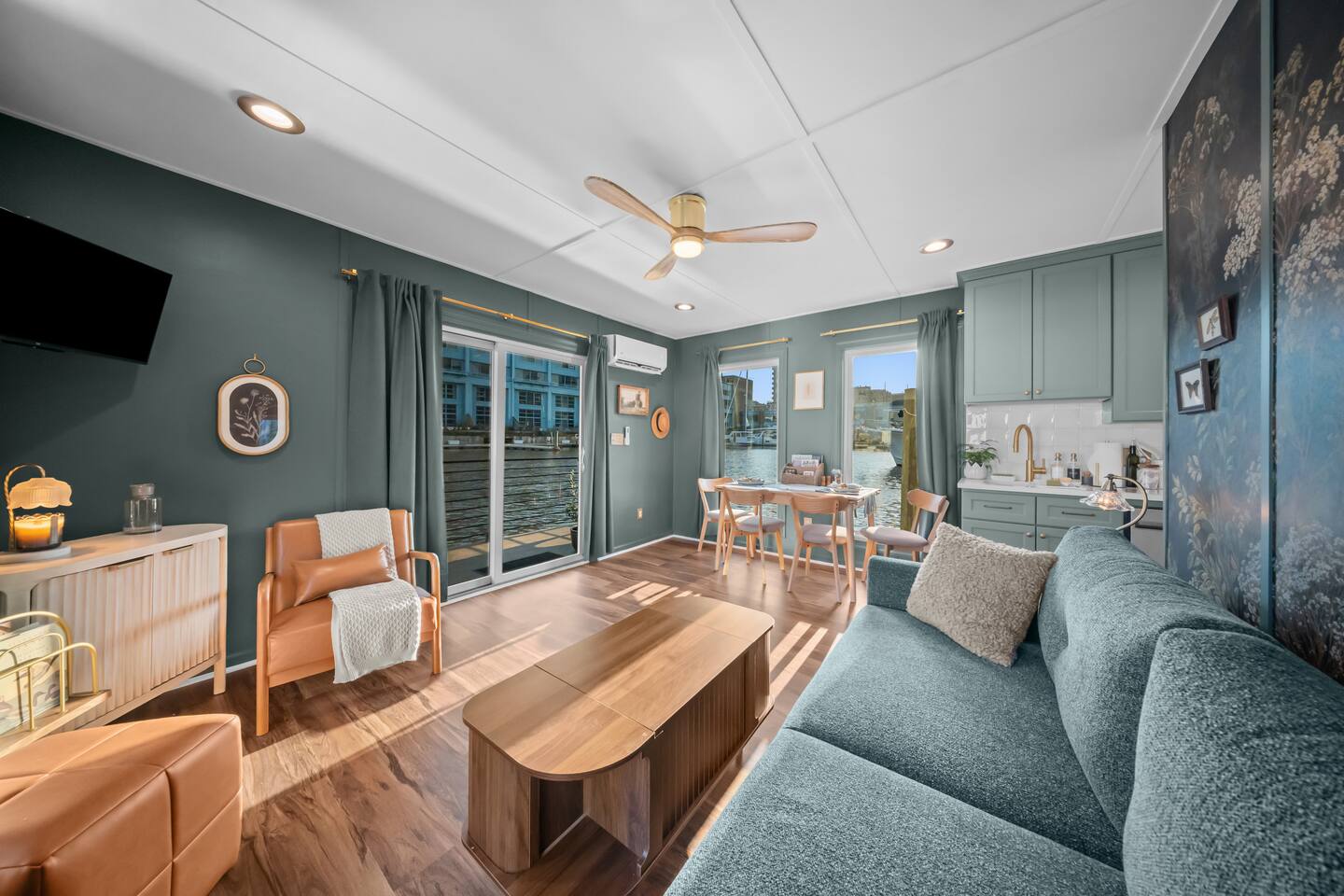 Living room with television and ceiling fan