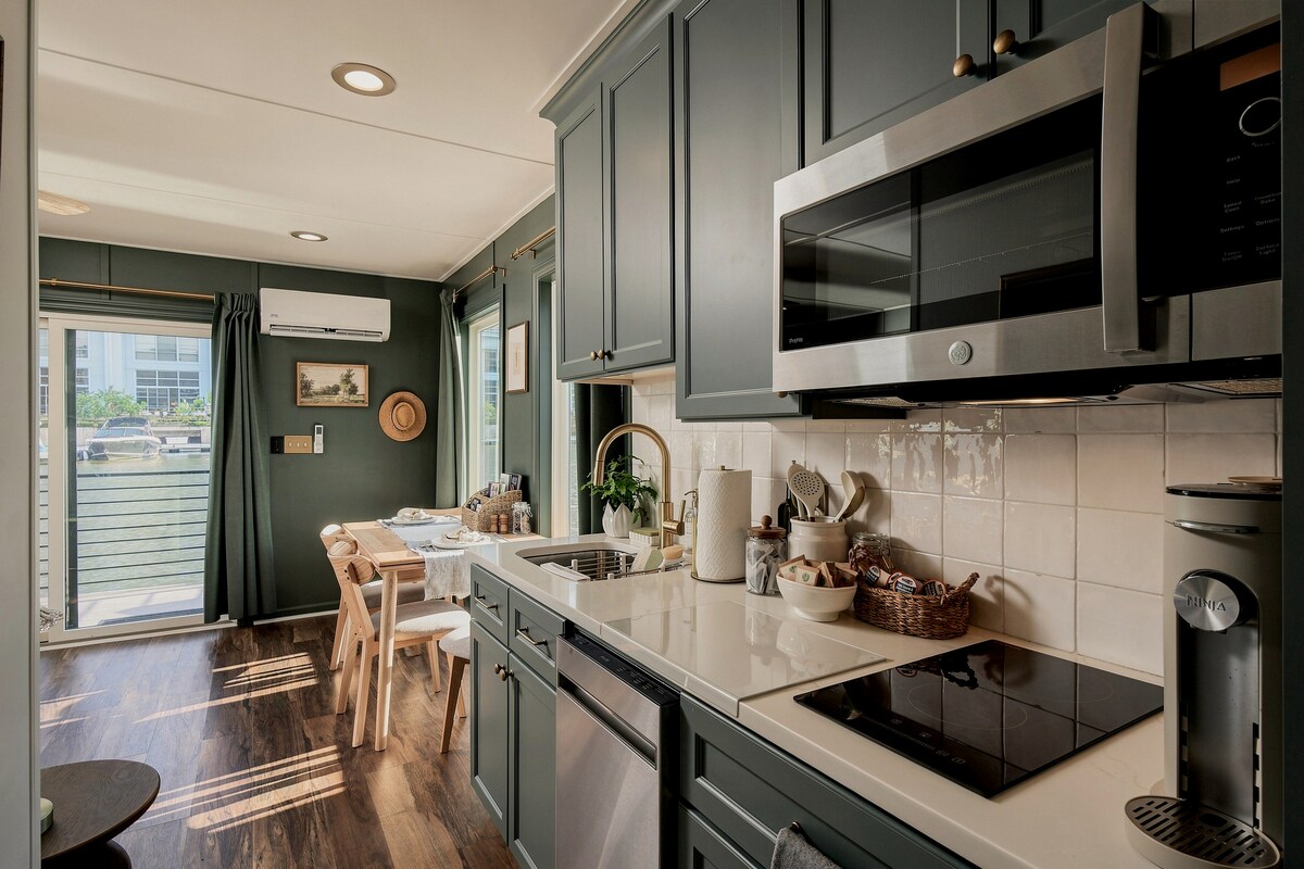 Kitchen with cooktop and microwave