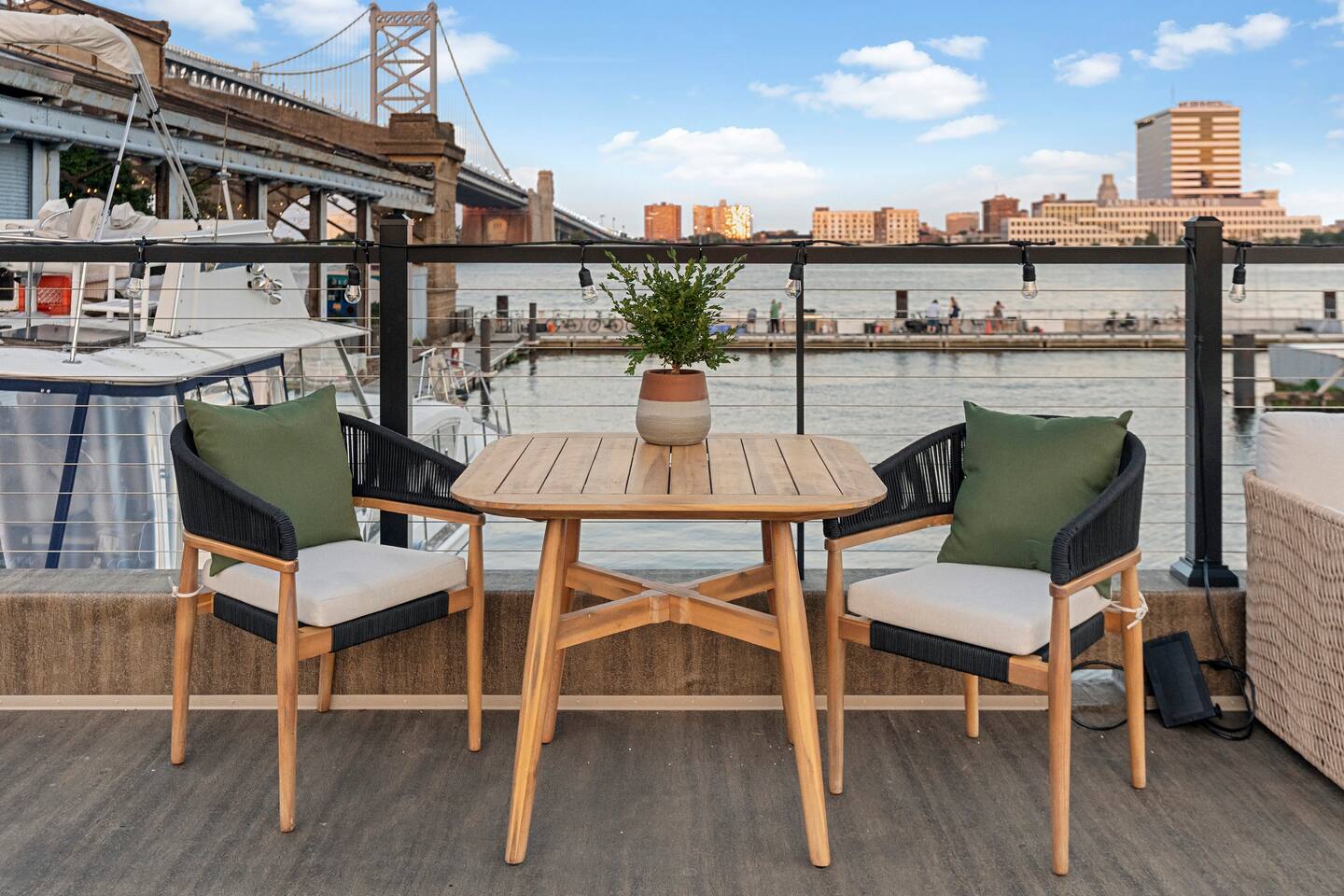 Rooftop dining table with the bridge behind